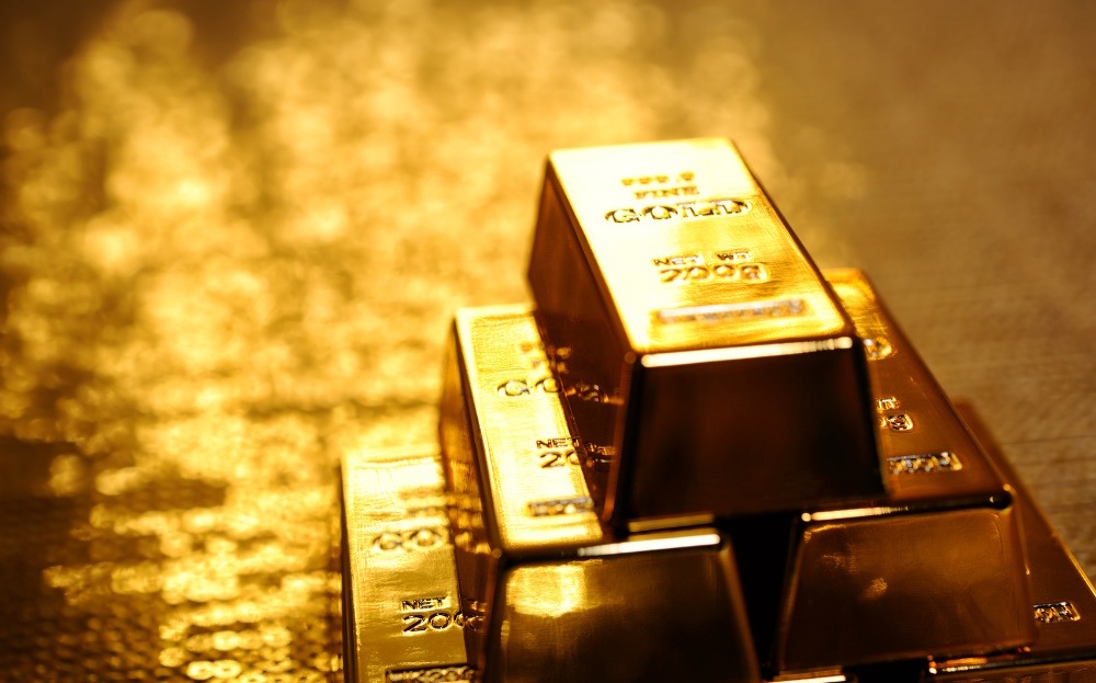 Softer dollar, bond yields boost gold prices to almost one-month high.